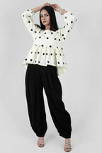 Muse Dots polka dot peplum top - front view