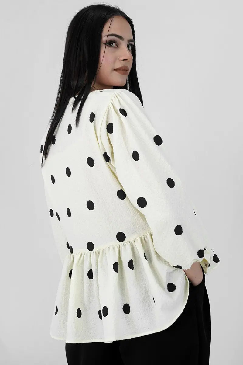 Muse Dots peplum top styled look