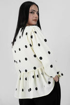Muse Dots peplum top styled look