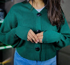 Knit cardigan button detailing close up